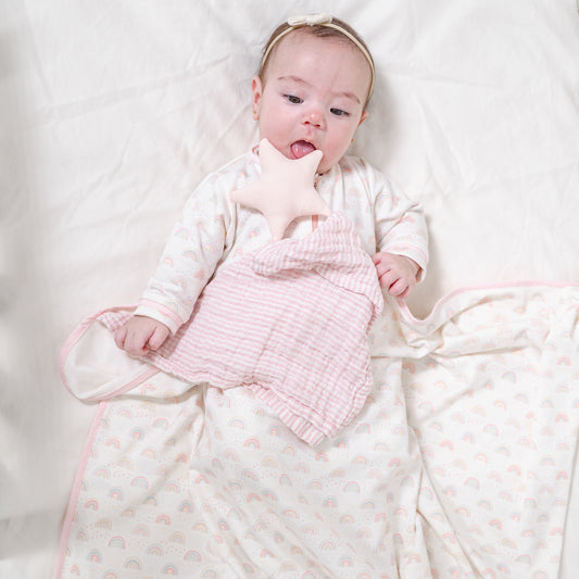 Set frazada con trapo de apego arcoíris rosa